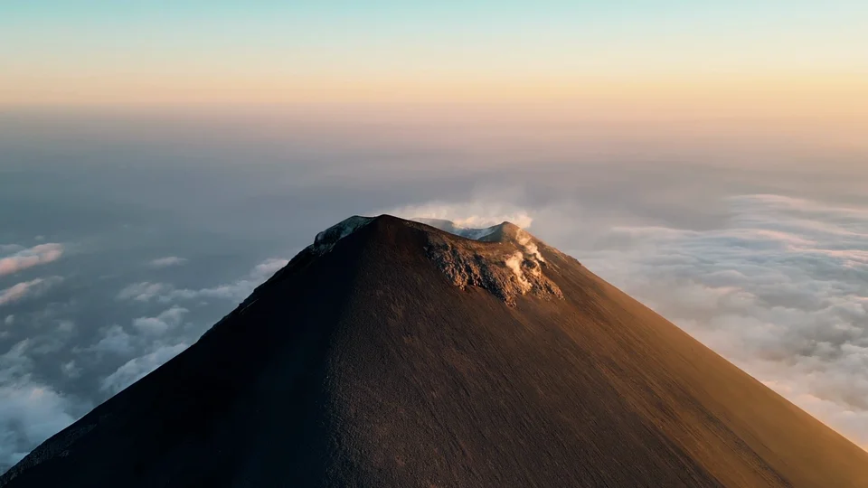 Sunrise light hitting the crater rim of Acatenango volcano, Guatemala