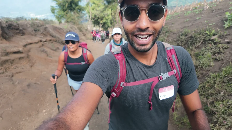 Hikers using trekking poles on the volcanic trail up Acatenango, Guatemala