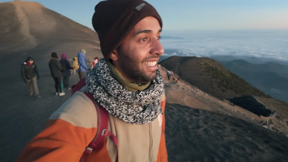 Hikers on the summit ridge of Acatenango at sunrise, Guatemala