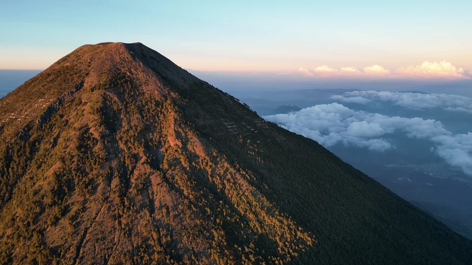 Acatenango volcano ridge above the clouds at sunset, Guatemala
