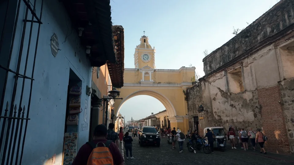 Santa Catalina Arch in Antigua, Guatemala, framed by a volcano