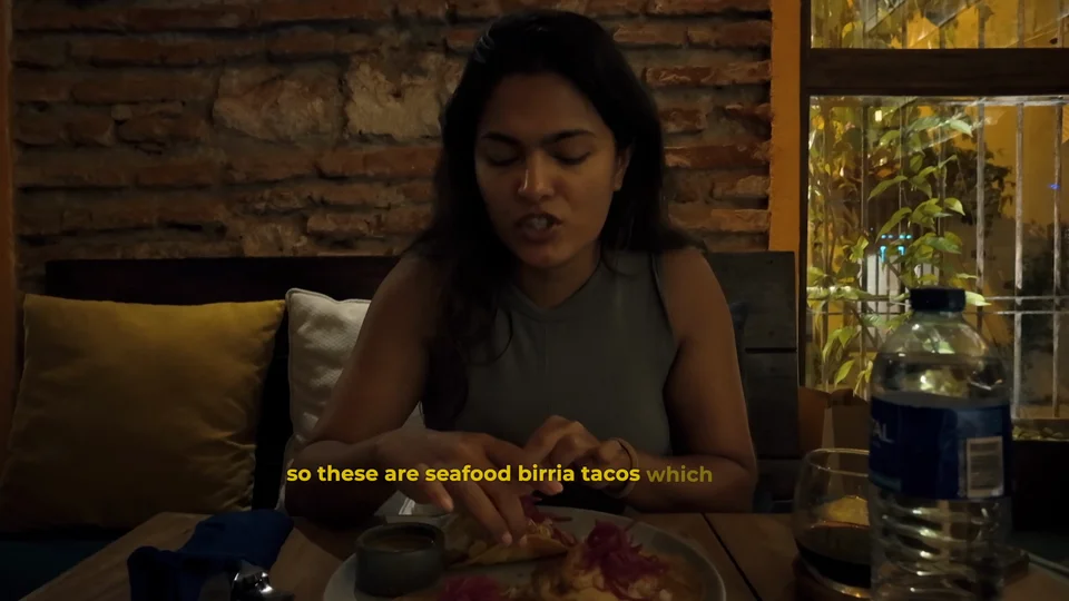 Eating seafood birria tacos at El Peso in Cartagena