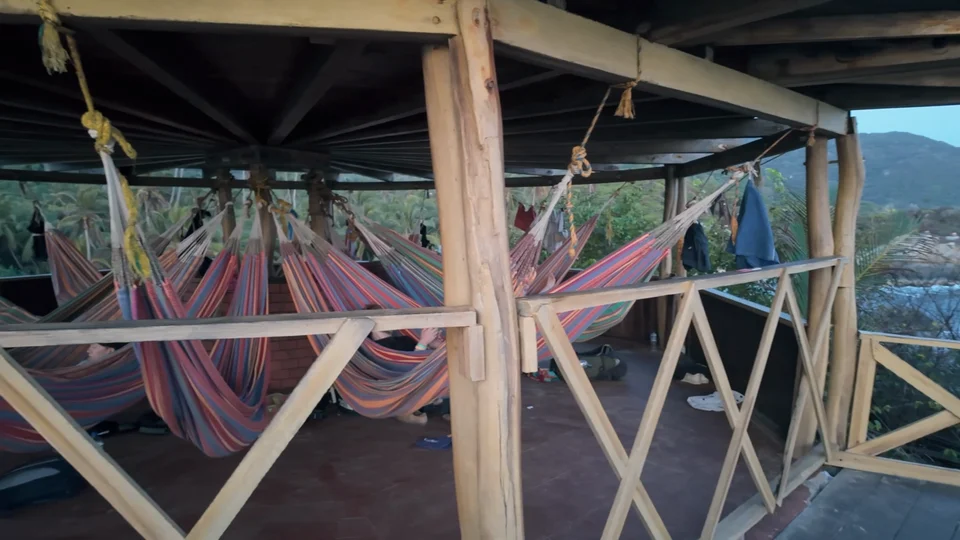 Hammocks strung up at a beachside hut in Tayrona National Park, Colombia
