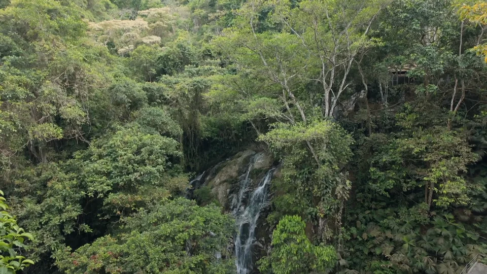 Aerial view of Cascada Marinka waterfall in the jungle near Minca, Colombia