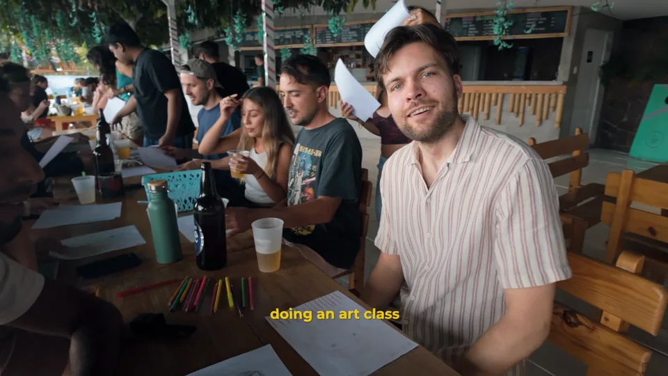 Family dinner with fellow travellers at Free Cerveza hostel, Lake Atitlán, Guatemala