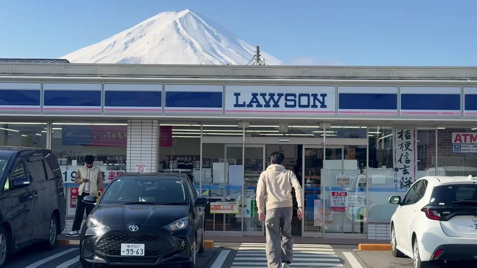 Lawson convenience store with Mount Fuji rising behind it