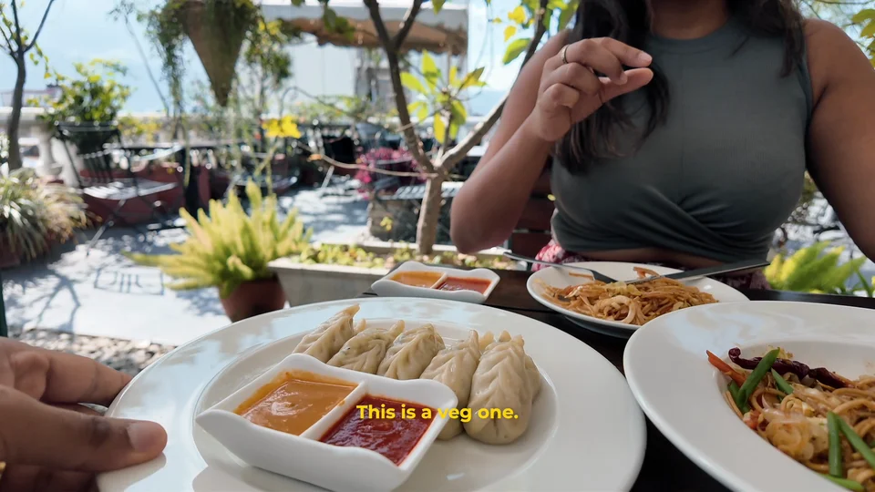 Plate of momos and lassi at a rooftop cafe in Kathmandu, Nepal