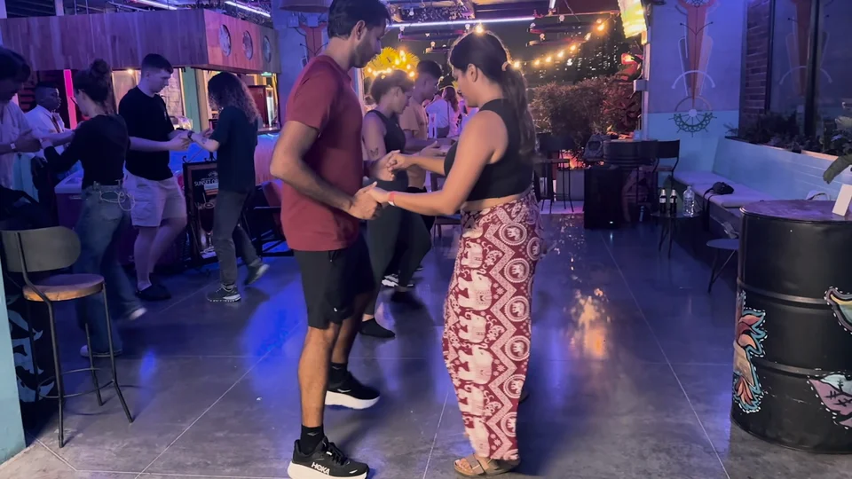Learning bachata dancing at a rooftop bar in Medellín, Colombia