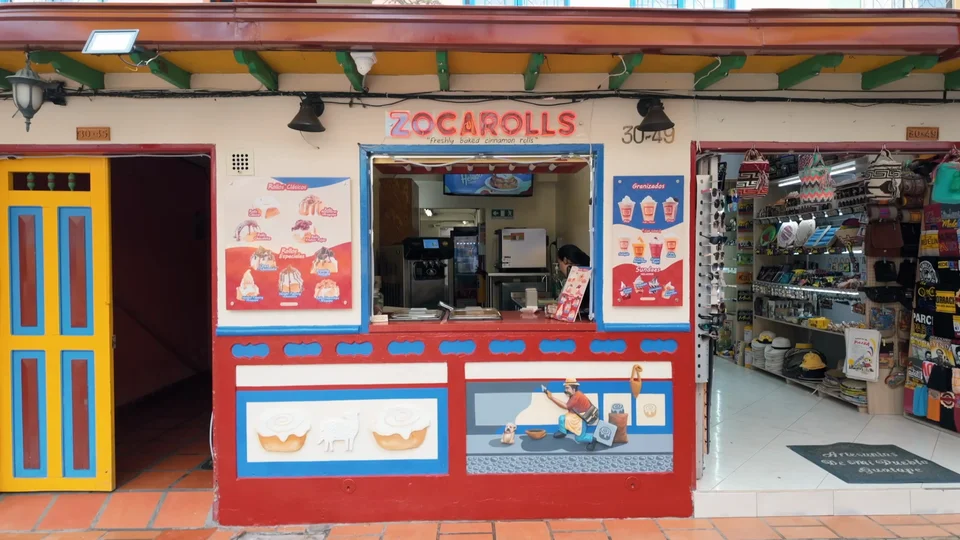 Colourful cinnamon roll shopfront on the streets of Guatapé, Colombia