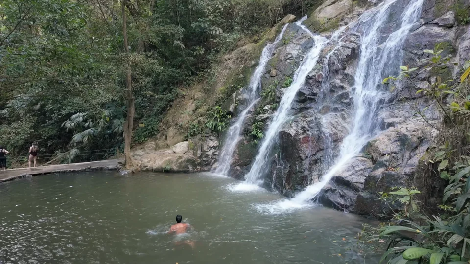 Swimming in the pool beneath Cascada Marinka waterfall, Minca, Colombia
