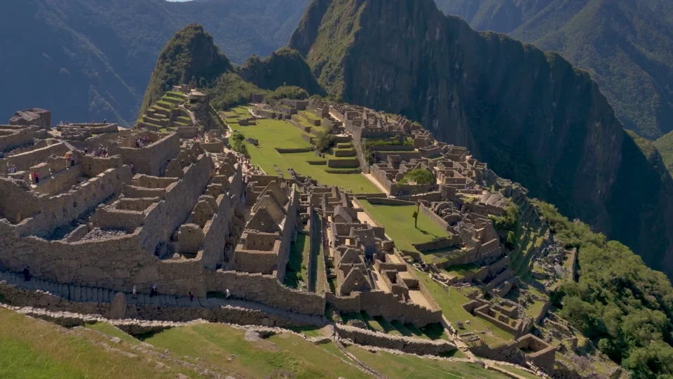 Machu Picchu revealed through the clouds from the Sun Gate