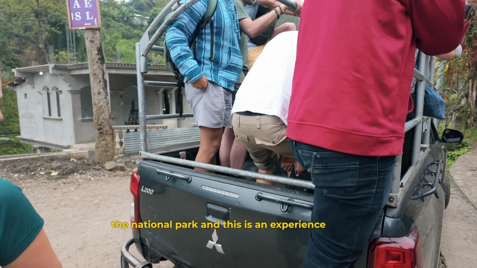 Riding on the back of an open air jeep to Semuc Champey, Guatemala
