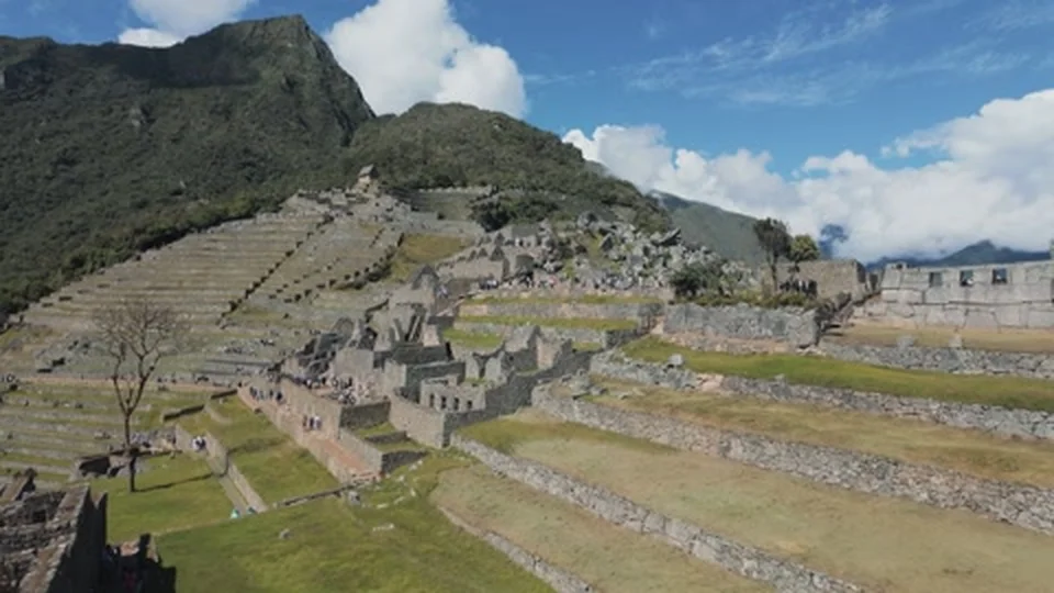 Machu Picchu emerging through the clouds