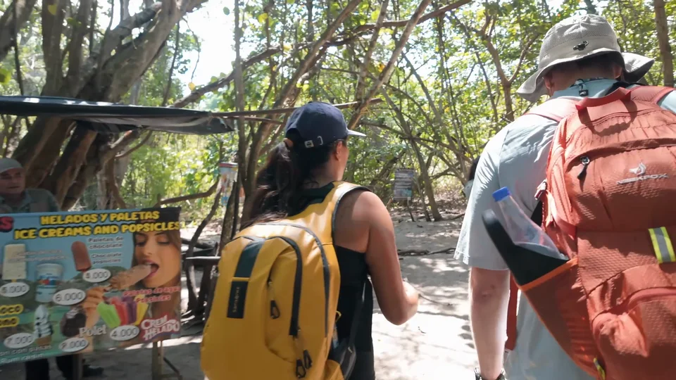 Buying Tayrona's famous bread from a jungle vendor on the trail