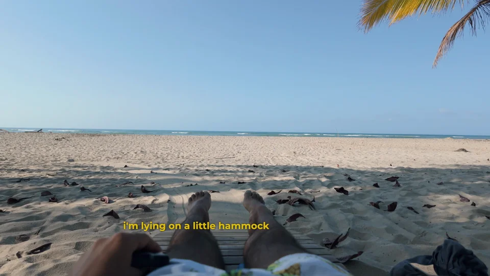 View from a hammock looking out over the beach at Viajero Hostels, Tayrona coast, Colombia