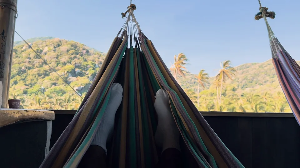 View of the hills from a hammock at the Cabo San Juan viewpoint hut, Tayrona National Park