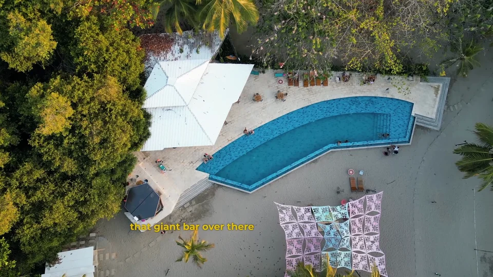 Aerial view of the beachside pool and bar area at Viajero Hostels near Tayrona, Colombia