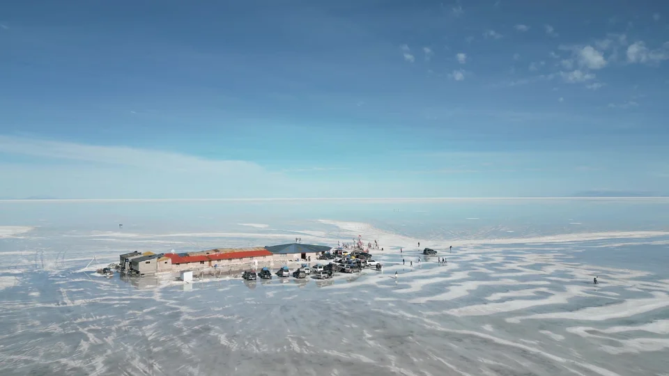 Aerial view of the salt hotel restaurant complex and Plaza de Banderas on the Uyuni Salt Flats