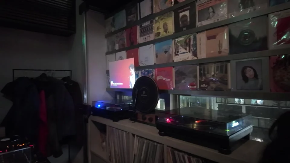 Wall of vinyl records at Spin Coaster, Ebisu