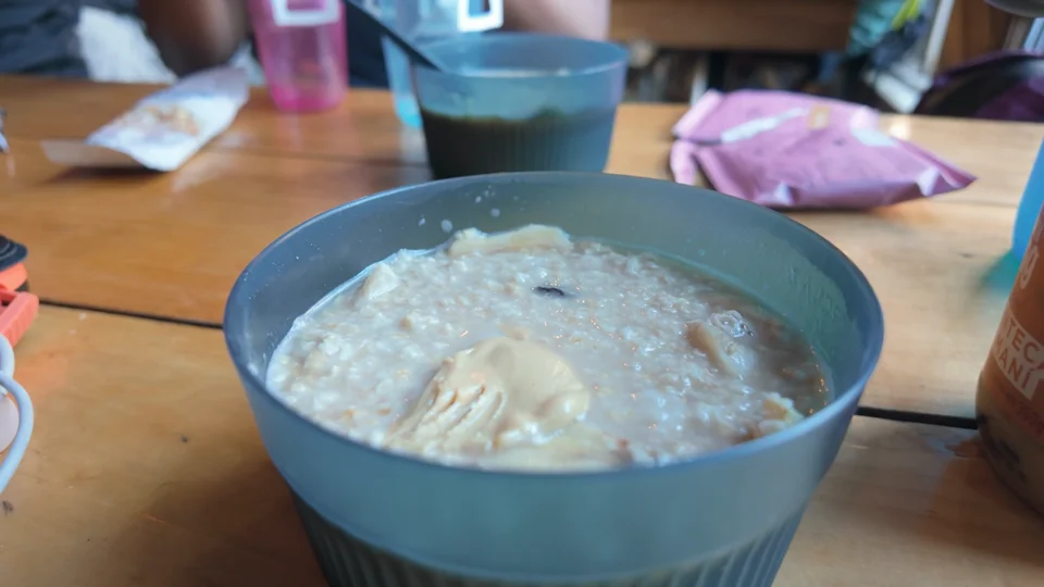 Bowl of porridge with peanut butter for breakfast at Camp Chileno on the W Trek