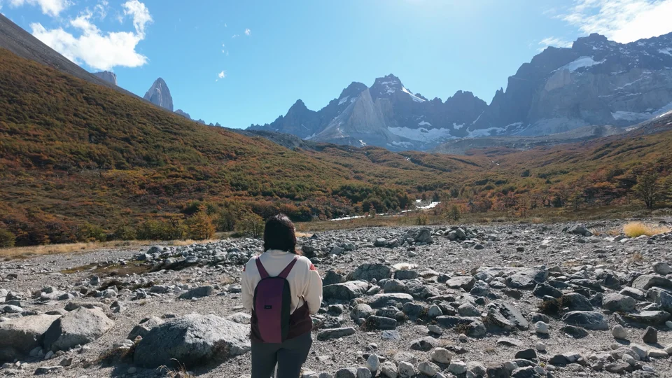 Wide valley view with hiker on the trail towards Paine Grande, Torres del Paine