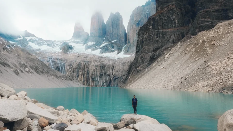 Turquoise glacial lake beneath the granite towers, Torres del Paine